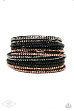 Load image into Gallery viewer, Black suede is spliced into six strands and embellished with rows of black, hematite, and metallic rhinestones brushed in a copper finish for a glitzy combination. The elongated leather band allow for a trendy double wrap design. Features an adjustable snap closure. Sold as one individual bracelet. CAN BE WORN AS A CHOKER NECKLACE AS WELL!
