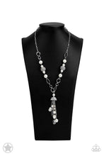 Load image into Gallery viewer, A half-shell studded in rhinestones overhangs a cluster of ivory pearls, tassels of silver chain, and small crystals. Two large wire mesh spheres and larger ivory pearls decorate the neckline.