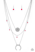 Load image into Gallery viewer, LUNAR LOTUS - Paparazzi - A silver floral pendant swings from the uppermost chain, above a strand of faceted pink beads swinging from a shimmery silver chain. A silver crescent frame swings from the lowermost chain, creating whimsical layers down the chest. Features an adjustable clasp closure. Sold as one individual necklace. Includes one pair of matching earrings.