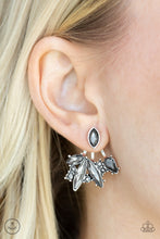 Load image into Gallery viewer, A solitaire smoky marquise cut rhinestone attaches to a double-sided post, designed to fasten behind the ear. Encrusted in a collision of mismatched smoky and hematite rhinestones, a double-sided post peeks out beneath the ear, creating a glittery fringe. Earring attaches to a standard post fitting.