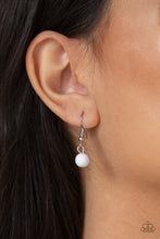 Load image into Gallery viewer, Infused with layers of mismatched silver chains, glassy, polished white, and glittery white rhinestones swing from the bottom of a bold silver chain, creating a bubbly fringe below the collar. Features an adjustable clasp closure.