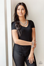 Load image into Gallery viewer, Infused with layers of mismatched silver chains, glassy, polished white, and glittery white rhinestones swing from the bottom of a bold silver chain, creating a bubbly fringe below the collar. Features an adjustable clasp closure.