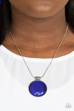 Load image into Gallery viewer, Attached to a decorative silver fitting, a dramatically oversized blue cat's eye stone pendant glides along a rounded silver snake chain below the collar for a powerful pop of color. Features an adjustable clasp closure. Sold as one individual necklace by Paparazzi Includes one pair of matching earrings.