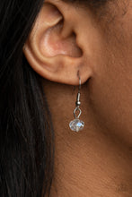 Load image into Gallery viewer, A blue teardrop gem, silver key, dainty crystal-like bead, and shimmery silver chain tassel swings from the bottom of a silver ring at the bottom of a lengthened silver chain, creating a whimsically tasseled display. Features an adjustable clasp closure.