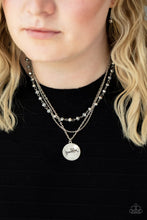 Load image into Gallery viewer, Promoted to Grandma - Silver - Paparazzi - Infused with a strand of metallic flecked hematite crystal-like beads, two dainty rows of mismatched silver chains delicately layer below the collar. Stamped in the word, "Grandma," a shiny silver disc swings from the lowest chain, creating a loving pendant.