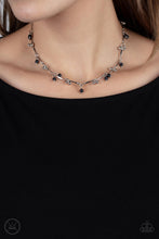 Load image into Gallery viewer, Sahara Social - Black - Paparazzi - Pairs of dainty silver beads and black stone beads dangle between faceted silver bars that interconnect around the neck, creating an earthy fringe.\