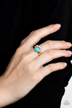 Load image into Gallery viewer, Paparazzi - Havasu Haven - Gold - Daintily crowned in a curved row of opaque white rhinestones, a round turquoise stone is pressed into the center of a dainty gold band, resulting an enchantingly earthy centerpiece atop the finger.