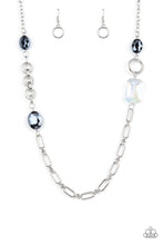 Load image into Gallery viewer, Famous and Fabulous - Blue - Paparazzi - A mismatched assortment of oval, round, textured, and silver hoops haphazardly link into a chaotic chain below the collar. Featuring oval and emerald style cuts, oversized metallic blue and iridescent gems sporadically adorn the chain for a glitzy finish.