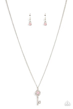 Load image into Gallery viewer, Paparazzi - Prized Key Player - Pink - Bordered in glassy white rhinestones, an opal pink rhinestone adorns a shiny silver key pendant at the bottom of a dainty silver chain for a whimsical fashion.