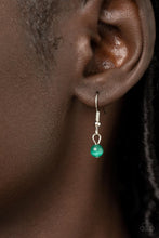 Load image into Gallery viewer, Gracefully Gemstone - Green - Paparazzi - A silver triangle frame tops a triangular cut green cat's eye stone pendant at the bottom of a dainty silver chain, resulting in a graceful gemstone pendant below the collar.