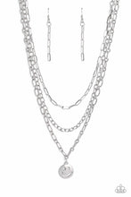 Load image into Gallery viewer, Paparazzi - Winking Wanderer - Silver - A trio of silver paperclip, classic, and oval link chains coalesces down the neckline for a monochromatic masterpiece. Strung on the lowermost oval link chain, a silver smiley face pendant, with a star mimicking a wink for one of its eyes, stands out and reflects light in every direction for a statement finish.