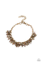 Load image into Gallery viewer, Paparazzi - Bracelet: Twinkly Twilight - Brass - Dainty brassy tone-on-tone iridescent beads swing from a classic brass chain, creating a clustered fringe around the wrist. Features an adjustable clasp closure.