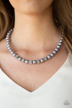 Load image into Gallery viewer, Infused with glittery rhinestone encrusted beads, a classic strand of silver pearls drapes below the collar in a timeless fashion. Features an adjustable clasp closure.  Sold as one individual necklace. Includes one pair of matching earrings.   Get The Complete Look!  Bracelet: &quot;POSHing Your Luck - Silver&quot;
