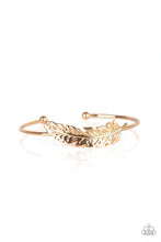 Load image into Gallery viewer, Featuring life-like detail, a shimmery gold feather folds along a dainty gold-tone cuff.
