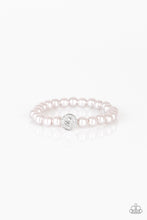 Load image into Gallery viewer, Silver pearls and a white rhinestone encrusted silver charm are threaded along a stretchy band, creating a glamorous centerpiece atop the wrist.
