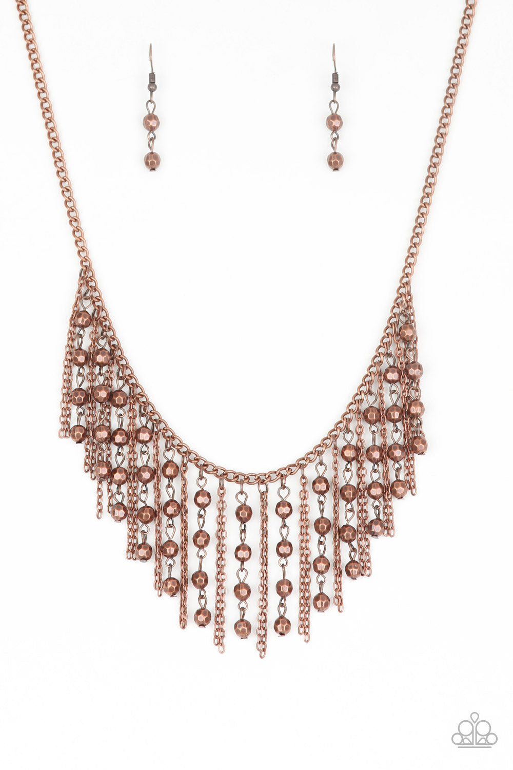 Strands of faceted copper beads and glistening copper chains stream from a matching copper chain, creating an edgy fringe below the collar. Features an adjustable clasp closure.  Sold as one individual necklace. Includes one pair of matching earrings.