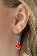 Load image into Gallery viewer, Three mismatched silver chains layer below the collar. A round red bead swings from the uppermost chain, above a scratched silver disc, and marquise-shaped red bead for a colorfully layered look. Features an adjustable clasp closure.  Sold as one individual necklace. Includes one pair of matching earrings.
