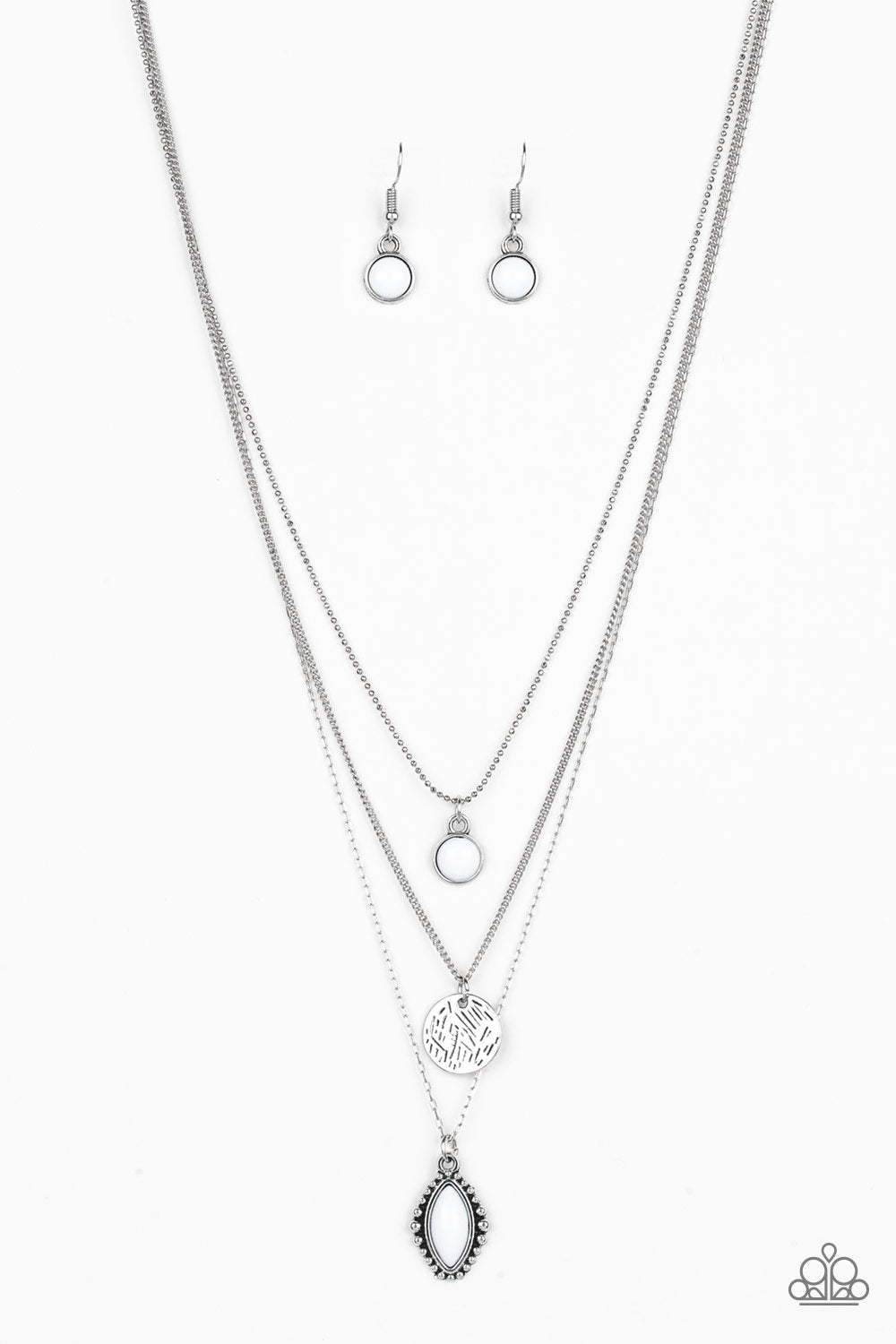 Three mismatched silver chains layer below the collar. A round white bead swings from the uppermost chain, above a scratched silver disc, and marquise-shaped white bead for a layered look. Features an adjustable clasp closure.  Sold as one individual necklace. Includes one pair of matching earrings.