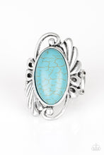 Load image into Gallery viewer, SEDONA SUNDET - Paparazzi - Chiseled into a smooth oval, a refreshing turquoise stone is pressed into the center of a glistening silver frame radiating with filigree detail. Features a stretchy band for a flexible fit.
