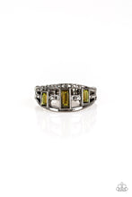 Load image into Gallery viewer, Three green emerald-cut iridescent &quot;oil spill&quot; rhinestones are encrusted along three gunmetal bands radiating with smooth surfaces and sections of glittery hematite rhinestones for an edgy fashion. Features a stretchy band for a flexible fit.
