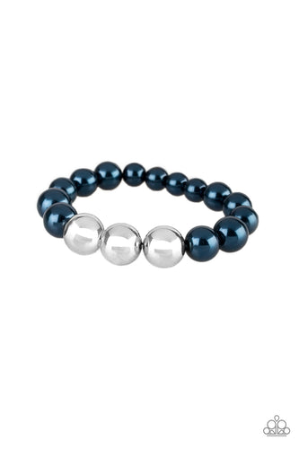 Gradually increased in size near the center, oversized pearly blue and shiny silver beads are threaded along a stretchy band around the wrist for a glamorous finish.