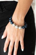Load image into Gallery viewer, Gradually increased in size near the center, oversized pearly blue and shiny silver beads are threaded along a stretchy band around the wrist for a glamorous finish.

