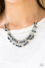 Load image into Gallery viewer, So In Season - Blue _ Paparazzi - Metallic blue gems and faceted silver beads dangle from two rows of silver chains, creating a glamorous fringe below the collar. Features an adjustable clasp closure.  Sold as one individual necklace. Includes one pair of matching earrings.
