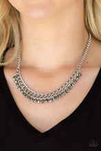 Load image into Gallery viewer, A fringe of glittery hematite rhinestones swings from the bottom of a bold silver chain below the collar for a fierce look. Features an adjustable clasp closure.

