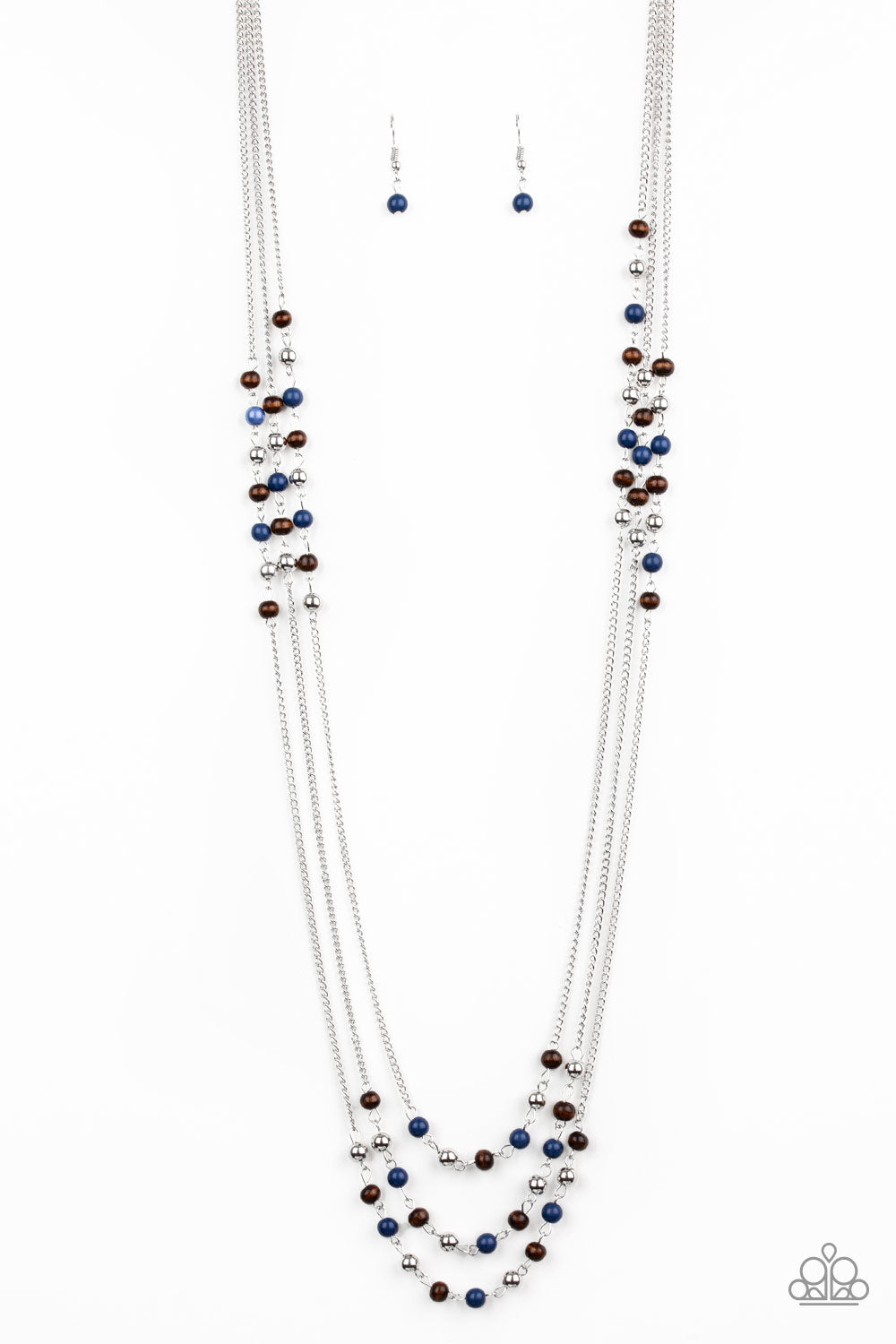 Dainty silver, blue, and wooden beads trickle along three shimmery silver chains, creating colorful layers across the chest. Features an adjustable clasp closure.  Sold as one individual necklace. Includes one pair of matching earrings.