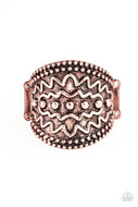 Studded and zigzagging textures are embossed across the front of a thick copper band for a tribal flair. Features a stretchy band for a flexible fit.
