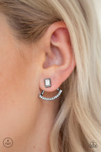 Load image into Gallery viewer, A solitaire emerald-cut rhinestone attaches to a double-sided post, designed to fasten behind the ear. Radiating with a bowing row of white rhinestones, the double sided-post peeks out beneath the ear for an edgy look. Earring attaches to a standard post fitting.
