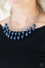 Load image into Gallery viewer, A collection of classic and imperfect blue pearls dangle from a web of interlocking silver links below the collar, adding a modern twist to the timeless palette. Features an adjustable clasp closure.  Sold as one individual necklace. Includes one pair of matching earrings.
