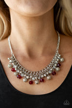 Load image into Gallery viewer, A collection of metallic net covered beads, shiny silver beads, and glittery red and metallic flecked crystal-like beads swing from the bottom of interlocking silver chains, creating a refined fringe below the collar. Features an adjustable clasp closure.  Sold as one individual necklace. Includes one pair of matching earrings.
