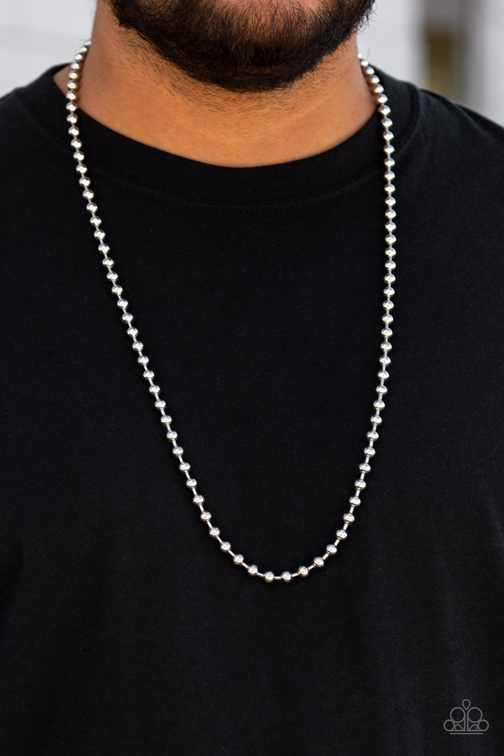 Featuring a high-sheen finish, a classic silver ball chain drapes across the chest for a casual look.  Sold as one individual necklaceby Paparazzi..