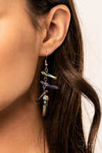 Load image into Gallery viewer, Featuring an oil spill iridescence, raw cut pieces of hematite are threaded along an invisible wire below the collar for a colorfully courageous look. Features an adjustable clasp closure.
