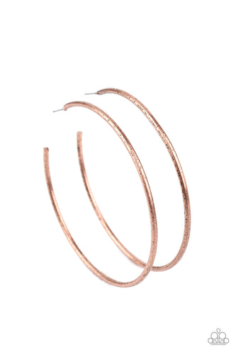 Delicately hammered in antiqued textures, a burnished copper bar curves into an oversized hoop for a rustic look. Earring attaches to a standard post fitting. Hoop measures approximately 2 1/2