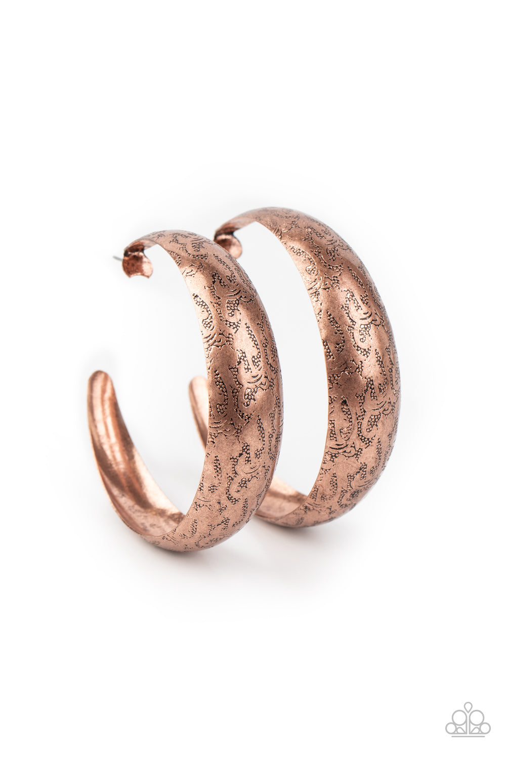 Delicately hammered in studded-like patterns, an oversized antiqued copper hoop boldly curls around the ear for a whimsically rustic look. Earring attaches to a standard post fitting. Hoop measures approximately 2