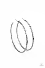 Load image into Gallery viewer, Etched and hammered in striking texture, a shimmery gunmetal bar delicately curls into a dramatically oversized hoop. Earring attaches to a standard post fitting. Hoop measures approximately 3&quot; in diameter.
