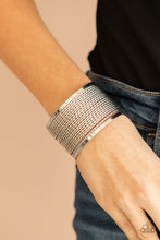 Load image into Gallery viewer, Twisted rows of silver wire layer between two flat silver bars, coalescing into a boldly stacked cuff around the wrist.
