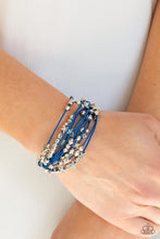 Load image into Gallery viewer, STAR-STUDDED AFFAIR - BLUE - Paparazzi - A collection of faceted silver beads and silver star charms slides along blue cords that layer across the wrist. Features a magnetic closure.
