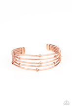 Load image into Gallery viewer, Ornate shiny copper beads are haphazardly threaded along textured &quot;polished, shiny, blush or penny&quot; copper bars that layer across the wrist, coalescing into an airy cuff.
