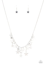 Load image into Gallery viewer, STELLAR STARDOM - A mismatched collection of shiny silver stars cascade from a dainty silver chain, creating a stellar fringe below the collar. Features an adjustable clasp closure.  Sold as one individual necklace. Includes one pair of matching earrings. Paparazzi
