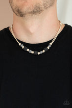 Load image into Gallery viewer, Decorative silver beads and pieces of black pumice-like rock are knotted in place below the collar for a seasonal look. Features a button loop closure.
