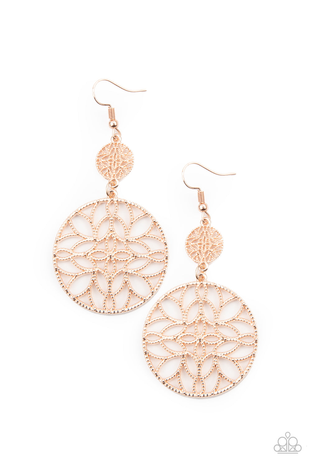 Featuring a stenciled mandala-like pattern, a studded rose gold frame swings from a dainty matching frame, creating a whimsical lure. Earring attaches to a standard fishhook fitting.