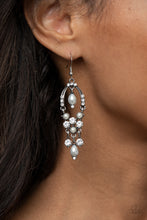 Load image into Gallery viewer, Back In The Spotlight - White - Glittery white rhinestones and pearly white beaded fittings delicately swing from the bottom of an ornately embellished oval frame. A matching pearly frame dangles from the top of the decorative silver frame, adding a timeless movement to the sparkly display. Earring attaches to a standard fishhook fitting.
