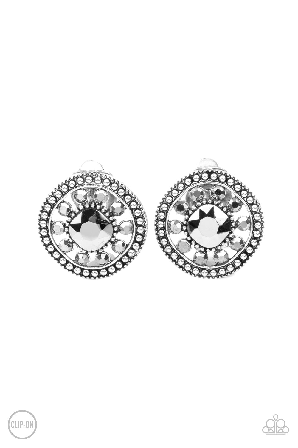 Featuring an oversized center, a hematite rhinestone encrusted flower blooms across the silver center of a studded frame for a sparkly finish. Earring attaches to a standard clip-on fitting.