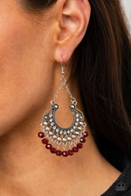Load image into Gallery viewer, White rhinestone dotted petals fan out into a studded scalloped frame. Fiery red crystal-like beads swings from the bottom of a decorative silver frame, creating a glamorous fringe. Earring attaches to a standard fishhook fitting.
