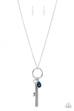Load image into Gallery viewer, A blue teardrop gem, silver key, dainty crystal-like bead, and shimmery silver chain tassel swings from the bottom of a silver ring at the bottom of a lengthened silver chain, creating a whimsically tasseled display. Features an adjustable clasp closure.
