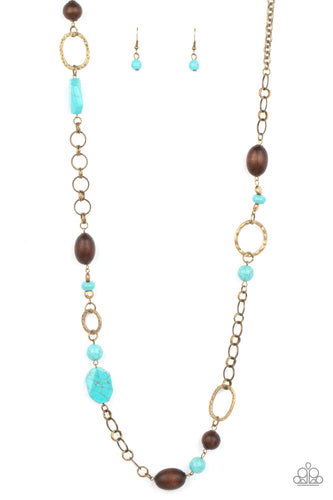 PRAIRIE RESERVE - Paparazzi - A mismatched assortment of turquoise stones, wooden beads, and brassy accents sporadically adorn a brass double-linked chain, creating an earthy display across the chest.