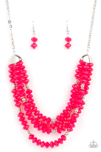 Featuring bold silver fittings, a whimsical collection of faceted pink opaque crystal-like beads and dainty silver beads are threaded along invisible wires below the collar, creating vivacious layers. Features an adjustable clasp closure.  Sold as one individual necklace. Includes one pair of matching earrings. 